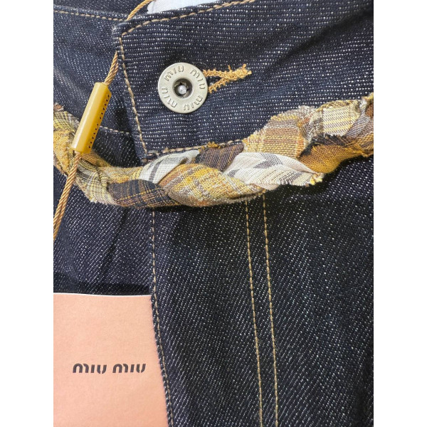  Стильные джинсы-трубы Miu Miu